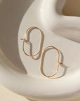 The Capsule Hoop Earrings By Token Jewelry