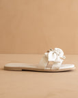 The Ginny White Textured Bow Slide