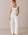 The Livia Scalloped Peplum Top