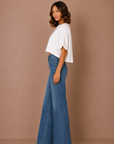 The Maeve Medium Denim Patch Pocket Wide Leg Flare Jeans