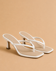 The Misha White Strappy Heel Sandal