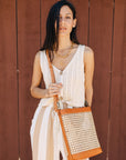 The Nori Rattan Crossbody Bag