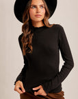 The Kory Black Lettuce Edge Turtleneck Top