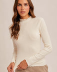 The Kory Ivory Lettuce Edge Turtleneck Top