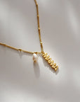 The MAMA Pearl Charm Necklace