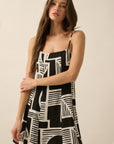 The Petra Black Abstract Mini Dress