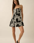 The Petra Black Abstract Mini Dress