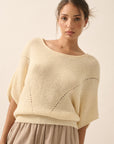 The Remy Cream Pointelle Ribbed Knit Sweater