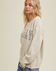 The Skye Black 'Vacay' Embroidered Sweater