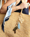 The Hand-Painted Spiral Shell Bag Charm + Keychain