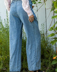 The Tommi Pleated Denim Trousers