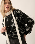 The Abstract Face Sweater