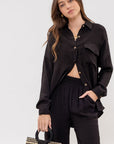 The Melia Black Button-down Top