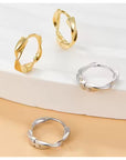The Twist Gold Huggie Earrings