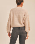 The Pom Pom Mockneck Sweater