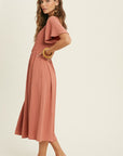 The Mimi Textured Smocked Midi Dress