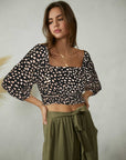 The Selena Animal Print Open Back Top