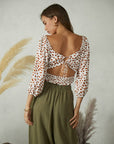 The Selena Animal Print Open Back Top