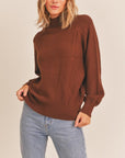 The Diamond Weave Mock Neck Sweater