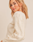 The Classic Fringe Sleeve Sweater