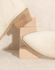 The Trinity Snakeskin Bootie