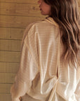 The Tiffani Twist Back Buttondown Top