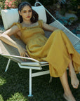 The Nalah Smocked Midi Dress