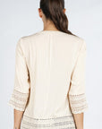 The Corrine Crochet Trim Babydoll Top