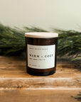 The Warm + Cozy Soy Candle in Amber Jar by Sweet Water Decor