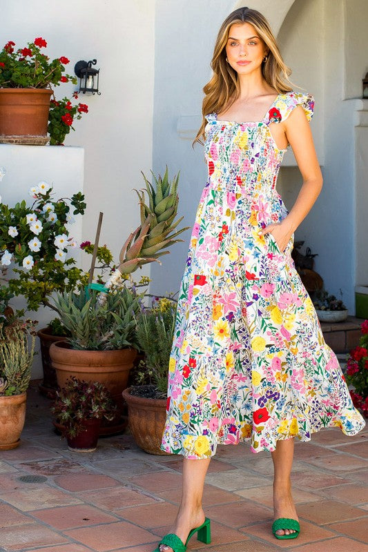 The Charlie Flower Print Smocked Midi Dress The Charlie Flower Print Smocked Midi Dress