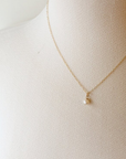 The Tiny Pearl Drop Necklace by Cire' Alexandria