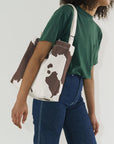 The Brown Cow Horizontal Duck Bag by Baggu