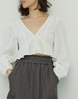 The Emery Cropped Peplum Blouse