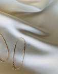 The Matriarch Elongated Hoops by Points Jewelry