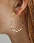 The Paloma Hammered Hoops by Token Jewelry