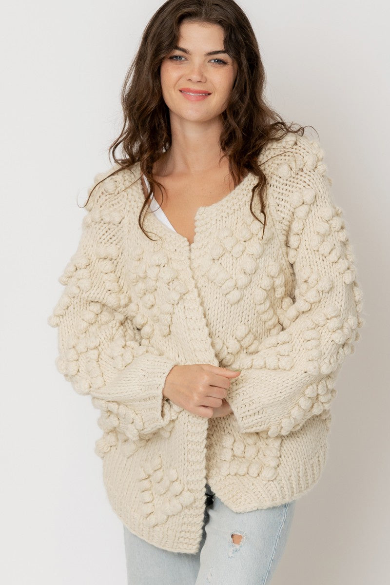 Pom pom 2025 cardigan sweater