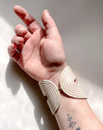 Saturn Clay Cuff by Little Pieces Jewelry