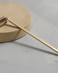 The Gold Tone Candle Snuffer