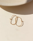 The Capsule Hoop Earrings By Token Jewelry