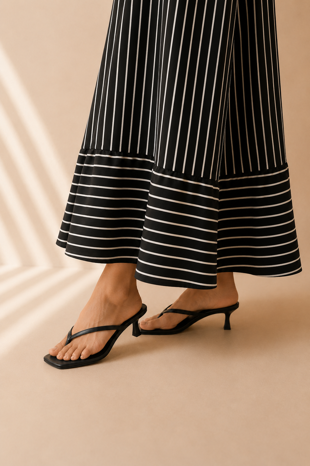 The Misha Black Strappy Heel Sandal