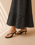 The Misha Black Strappy Heel Sandal
