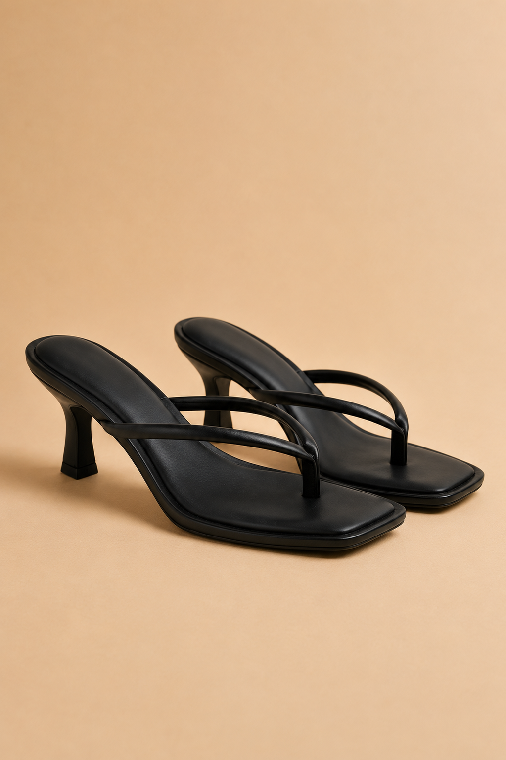 The Misha Black Strappy Heel Sandal