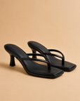 The Misha Black Strappy Heel Sandal