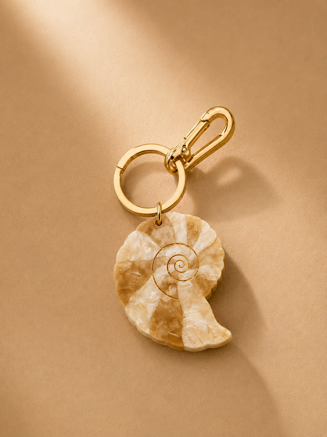The Hand-Painted Spiral Shell Bag Charm + Keychain