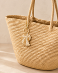 The Hand-Painted Spiral Shell Bag Charm + Keychain