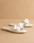 The Ginny White Textured Bow Slide
