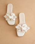 The Ginny White Textured Bow Slide