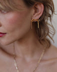 The Herringbone Chain Bow Stud Earrings