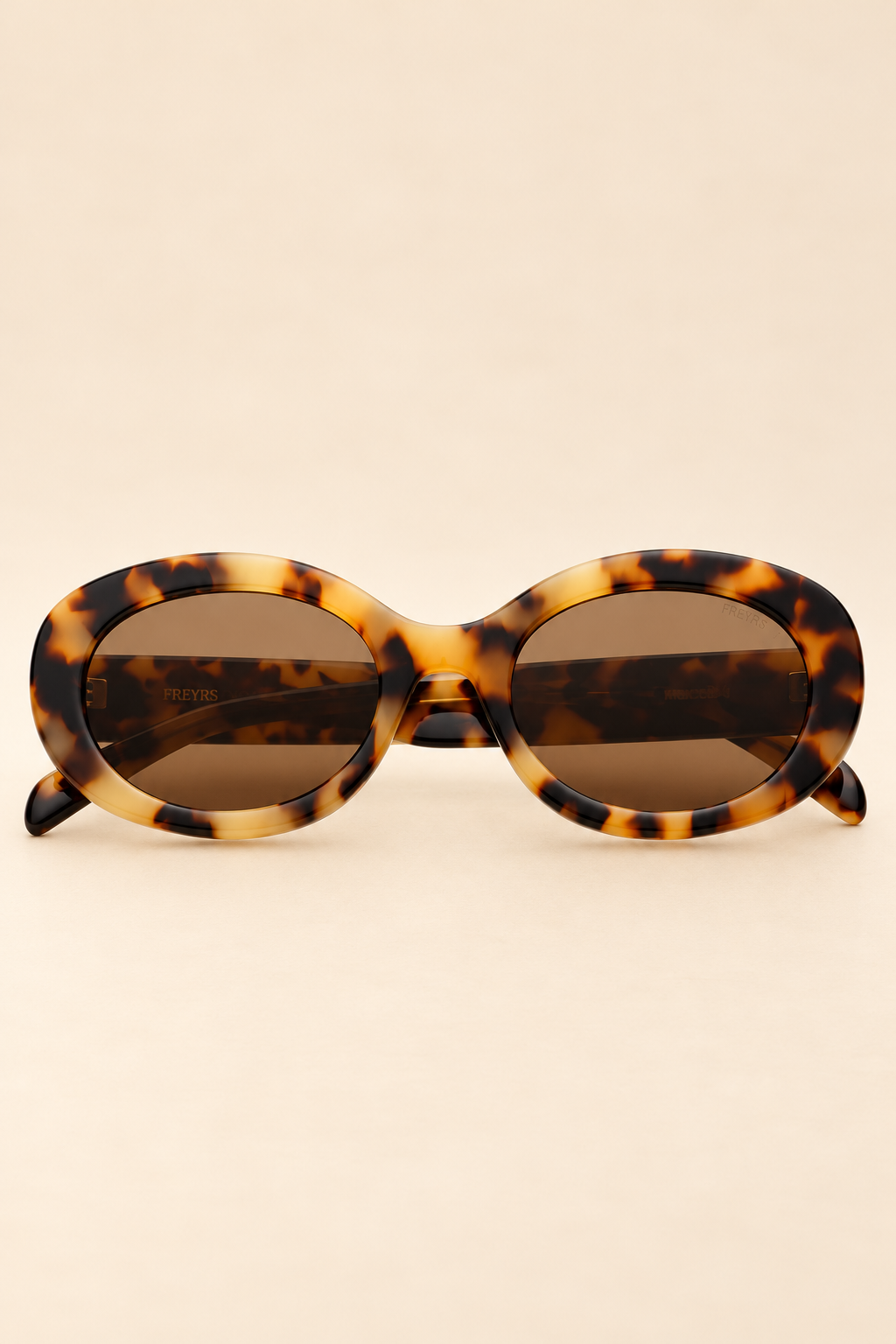 The Aria Milky Tortoise Acetate Oval Sunglasses