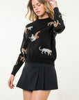 The Journee Jaguar Knit Sweater